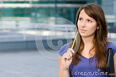 Pretty caucasian girl pondering or thinking Stock Photo