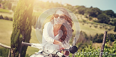 Pretty cheerful woman in the garden Stock Photo