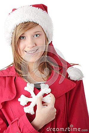 Pretty christmas teen girl in santa hat Stock Photo