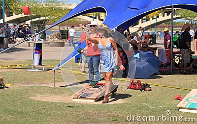 Tempe, Arizona : Lawn Game Cornhole - Throwing the bag Editorial Stock Photo