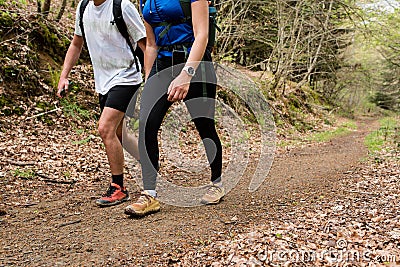 Young couple hiking in the mountains of the French Basque Country Stock Photo