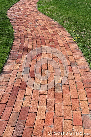 Pretty curved brick walkway Stock Photo