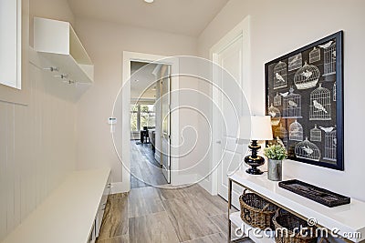 Pretty entrance foyer with an extra long built-in bench Stock Photo