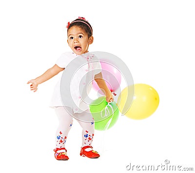 Pretty expressive little girl with balloons Stock Photo