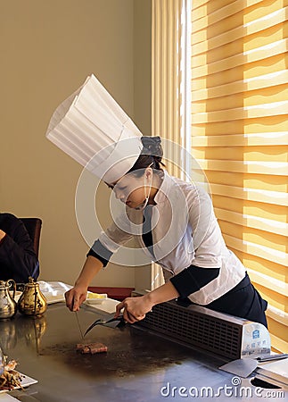 Pretty female chef Editorial Stock Photo