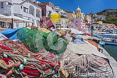 Pretty fishing village, colourful fishermen`s houses, and fishing nets, Marina Corricella Procida Island, Bay of Naples, Italy Stock Photo