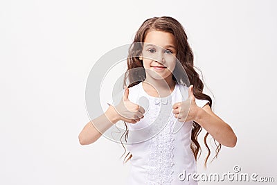 Pretty Girl. Dark curly hair. Gesture approval Stock Photo