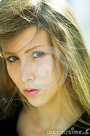 Pretty girl with dishevelled hair Stock Photo