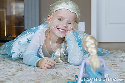 Pretty girl dressed as Disney Frozen Princess Elsa Stock Photo