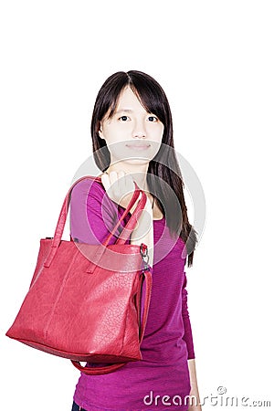 Pretty girl holding a red hand bag Stock Photo