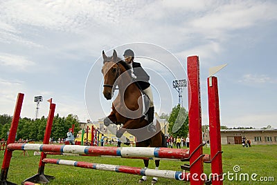 Pretty girl horse jump Stock Photo
