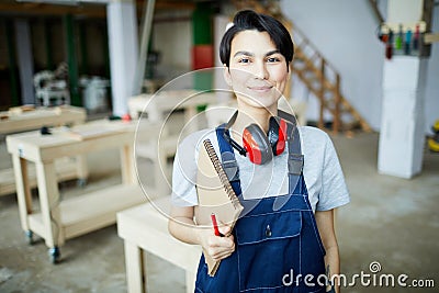 Pretty girl learning about carpentry Stock Photo