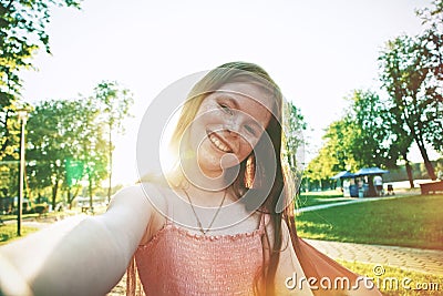Pretty girl making self-portrait selfie Stock Photo