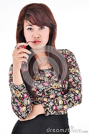 Pretty girl posing and biting glasses Stock Photo