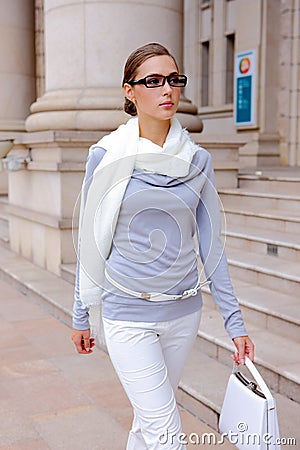 Pretty girl walking down the street Stock Photo