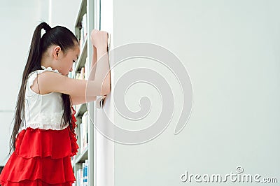 Pretty girls studying in the library Stock Photo