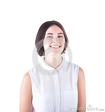 A pretty and happy student girl in a white blouse, isolated on a white background. A professional business lady looks cheerful. Stock Photo