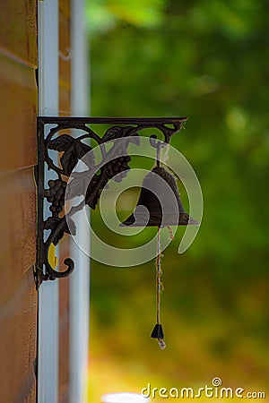 Pretty house entrance bell with spider thread Stock Photo