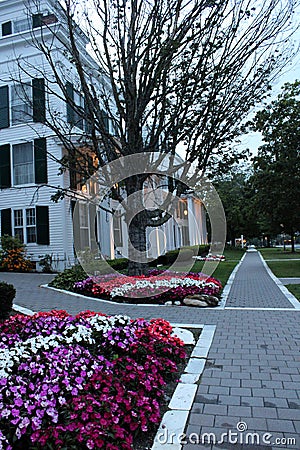 Right before sunset, with brick walkways and flower gardens lining the main streets, Manchester, Vermont, Summer, 2022. Editorial Stock Photo