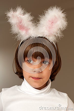 Pretty little girl in bunny ears Stock Photo