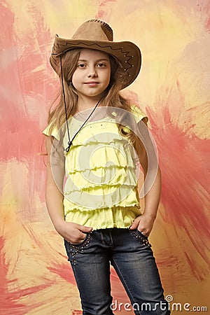 Pretty little girl with cute face in western cowboy hat Stock Photo