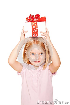 Pretty little girl with gift on head. Stock Photo