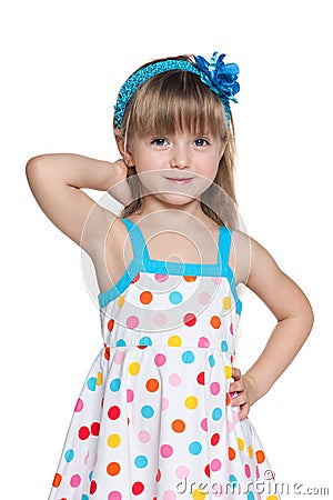 Pretty little girl in polka dot dress Stock Photo