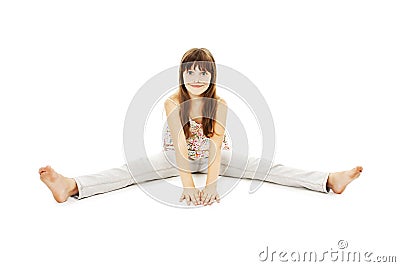 Pretty little girl sitting on the floor in jeans Stock Photo