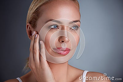 Pretty middle age woman with perfect skin Stock Photo