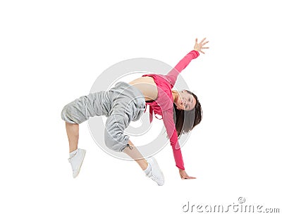 Pretty modern slim hip-hop style teenage girl jumping dancing Stock Photo