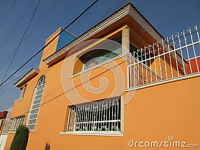 Pretty Orange House in Mexico Stock Photo