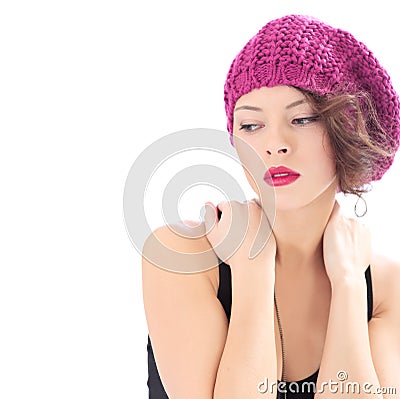 Pretty serious woman wearing pink hat Stock Photo