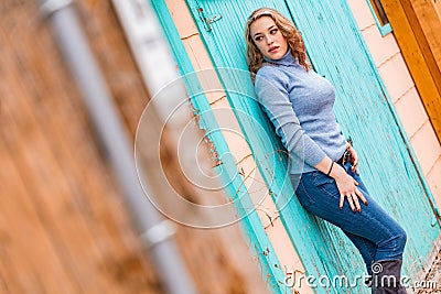 Pretty blonde girl woman in turtleneck sweater Stock Photo