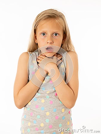 Pretty shocked, surprised little girl looking scared and with fear. Human emotions and expressions Stock Photo