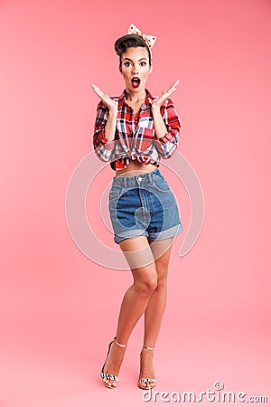 Pretty shocked young pin-up woman Stock Photo