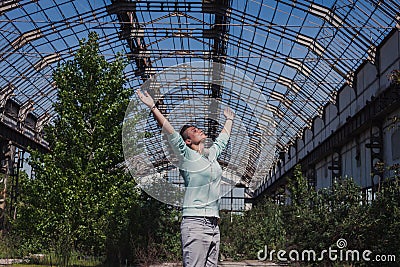 Pretty short hair girl in an abandoned factory Stock Photo