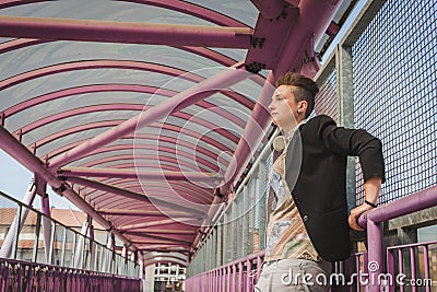 Pretty short hair girl posing on a bridge Stock Photo