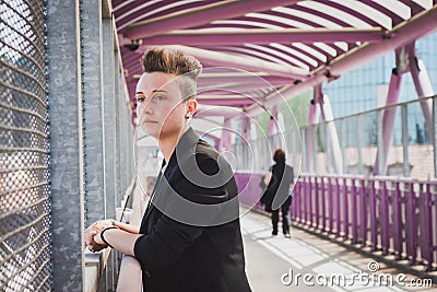 Pretty short hair girl posing on a bridge Stock Photo