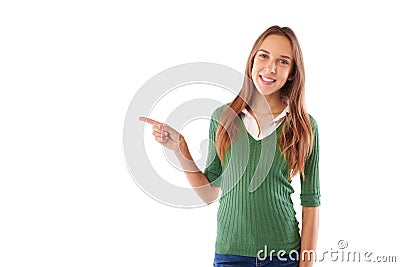 Pretty slender girl showing direction with index finger sideways Stock Photo