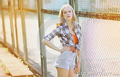 Pretty slim model posing in the city, hipster girl Stock Photo