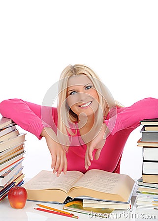 Pretty smart woman with lots of books study Stock Photo