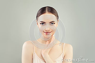 Pretty spa woman with clear skin. Skin care, wellness and cosmetology Stock Photo
