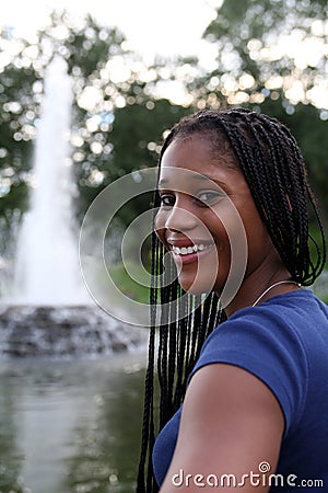 Pretty teen with fountain Stock Photo