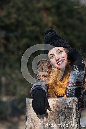 Pretty teen wear scarf and skull cap Stock Photo