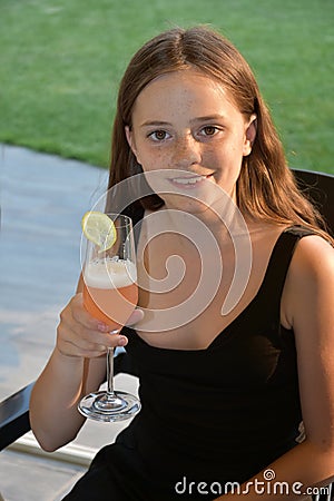 Teenage girl with non alcoholic cocktail Stock Photo