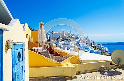 Pretty traditional houses with sea view terraces in Fira Santorini Greece Stock Photo