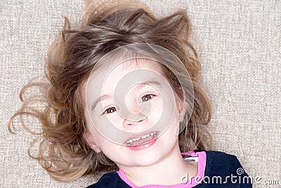 Pretty vivacious three year old little girl Stock Photo