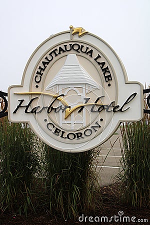 Pretty white sign advertising the Chautauqua Harbor Hotel, Celoron, New York, 2021 Editorial Stock Photo