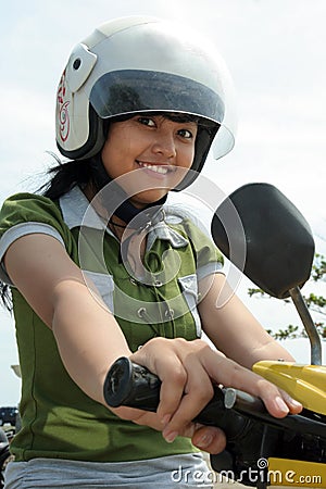 Pretty woman on bike Stock Photo