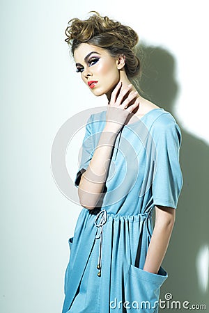 Pretty woman in blue dress Stock Photo